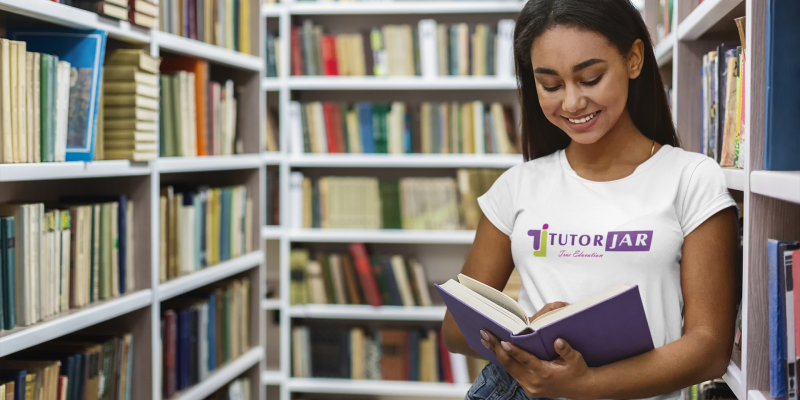 Person reading in a library.